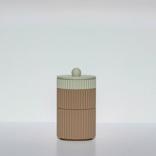 A beige and brown cylindrical coffee mega stack with a round lid on top, placed against a white background.